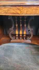 Antique wood inlay vanity with mirror and bench.